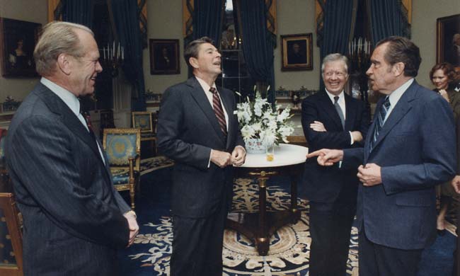 Los cuatro presidentes charlan en el Salón Azul de la Casa Blanca en Washington, DC el 8 de octubre de 1981, antes de partir a Egipto para el funeral de Sadat. El 10 de diciembre del 2003, los Archivos Nacionales de los Estados Unidos, hicieron públicas 240 horas de las grabaciones de Nixon en la Casa Blanca, hechas entre Julio y octubre de 1972. En una de ellas Nixon llama a su compañero de partido "extraño" y un "hombre al lado del cual es incomodo estar". 